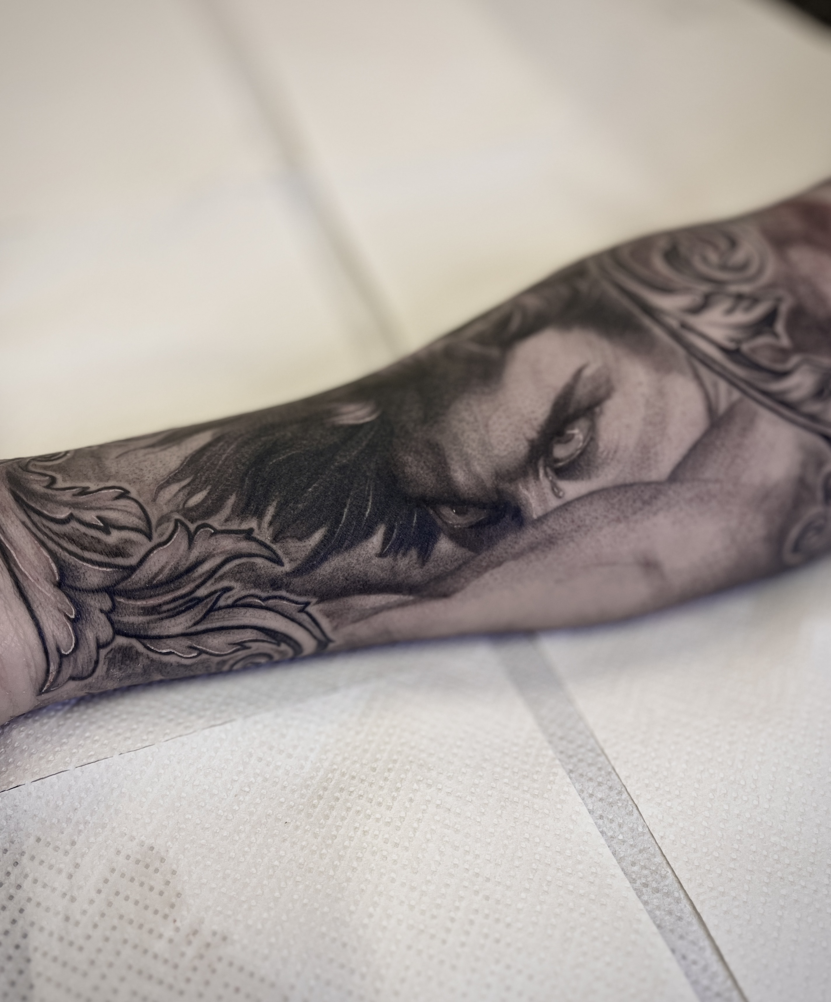 Tatouage réaliste visage chez Lab Tattoo Lausanne